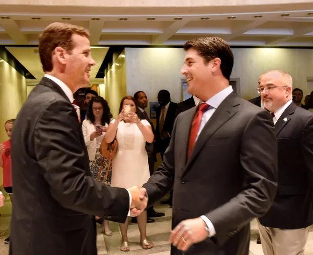 From the left Senate President Andy Gardiner, R-Orlando, and Speaker Steve Crisafulli, R-Merritt Island, greet each other with a congratulatory handshake in the Capitol rotunda after approving a state budget as the special session of the Legislature drew to a close "sine die" June 19, 2015. Closing and integration services, sorted by whether to buy the job in or keep it