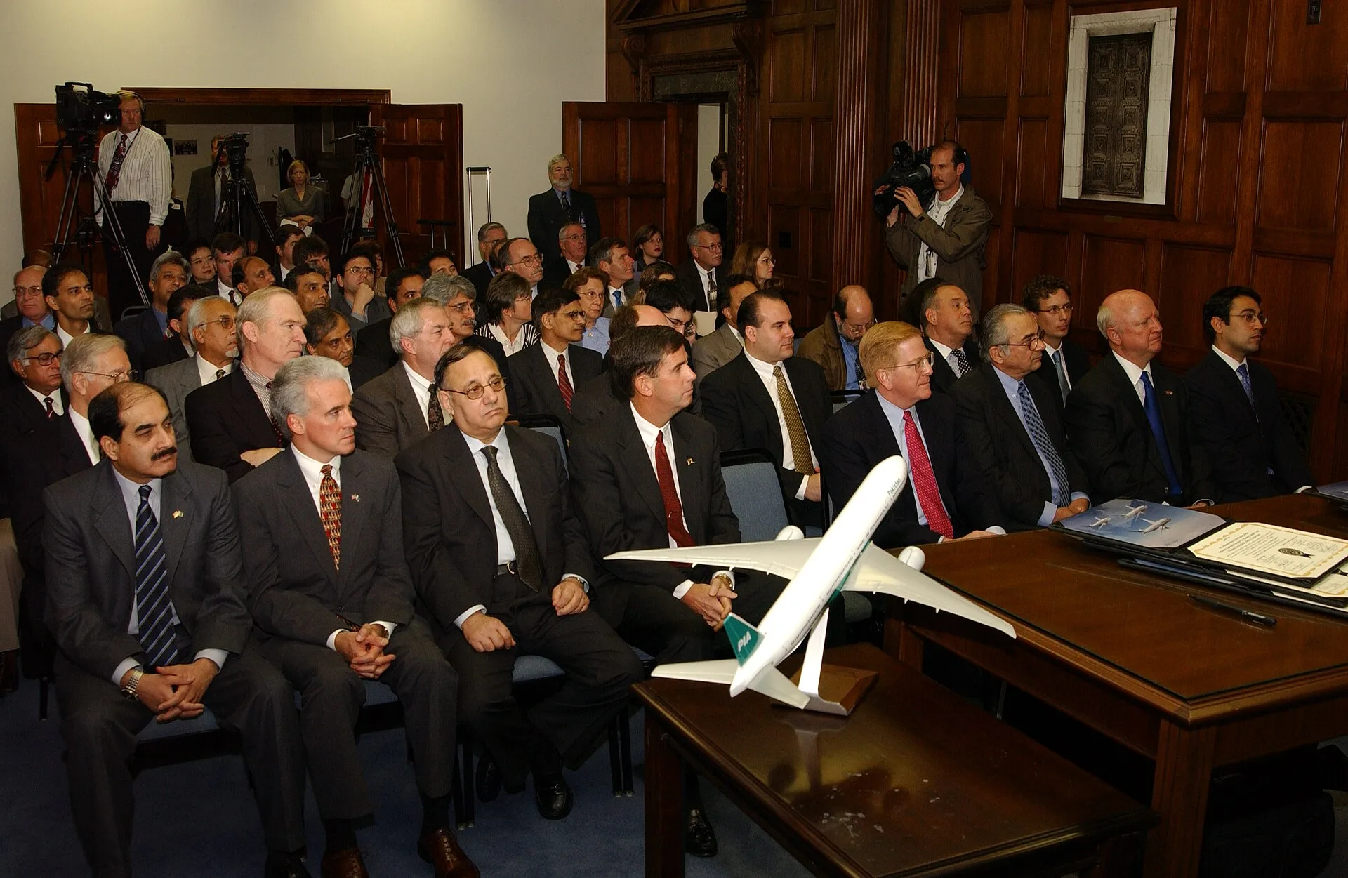 Assignment: OS_DS_2003_1202_6] Office of the Deputy Secretary - BOEING-PAKISTAN PURCHASE AGREEMENT - SIGNING [40_CFD_OS_DS_2003_1202_6_DSC_0076.JPG. Buyer search examples: ten fictional decision points