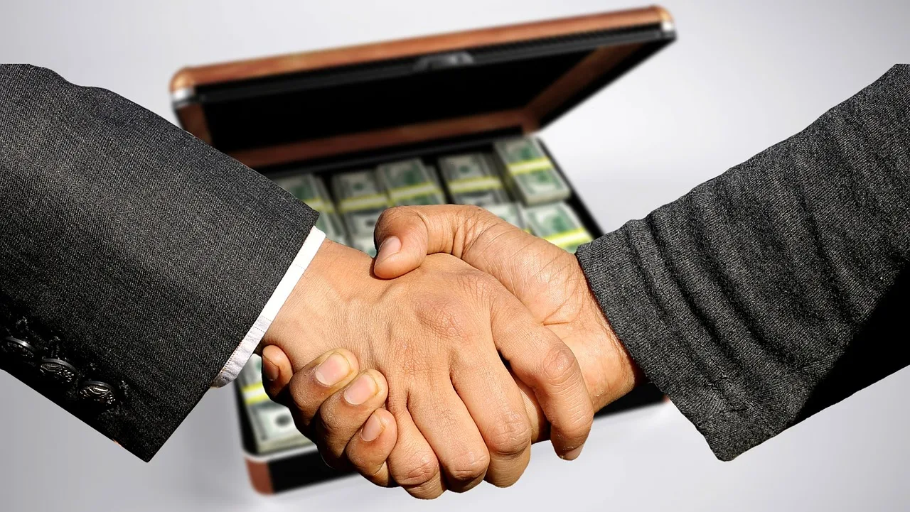conclusion of contract, handshake, trade, business, profit, black money, control, treasury, sale, to buy, selling, commercial, shopping, money case, currency, money, contract, dollar, shaking hands, handshake, handshake, selling, selling, selling, selling, selling. Chicago family business sales: buy-sell deals, tax and notes