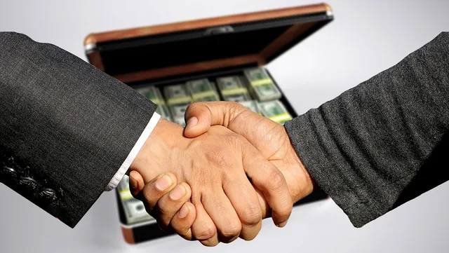 conclusion of contract, handshake, trade, business, profit, black money, control, treasury, sale, to buy, selling, commercial, shopping, money case, currency, money, contract, dollar, shaking hands, handshake, handshake, selling, selling, selling, selling, selling. Chicago family business sales: buy-sell deals, tax and notes