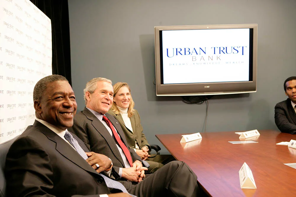 President George W. Bush sits with Bob Johnson, founder and chairman of the RLJ Companies, and Kathy Boden, right, president and CEO of Blue House Water Solutions , during a meeting to discuss the economy with small business owners and community bankers, Monday, Oct. 23, 2006 at the Urban Trust Bank. Seller preparation mistakes often look like sound decisions at the time
